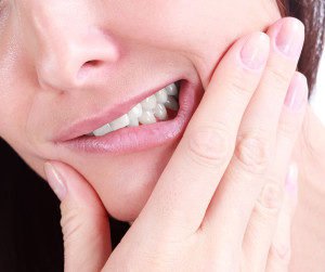 Woman with a tooth pain